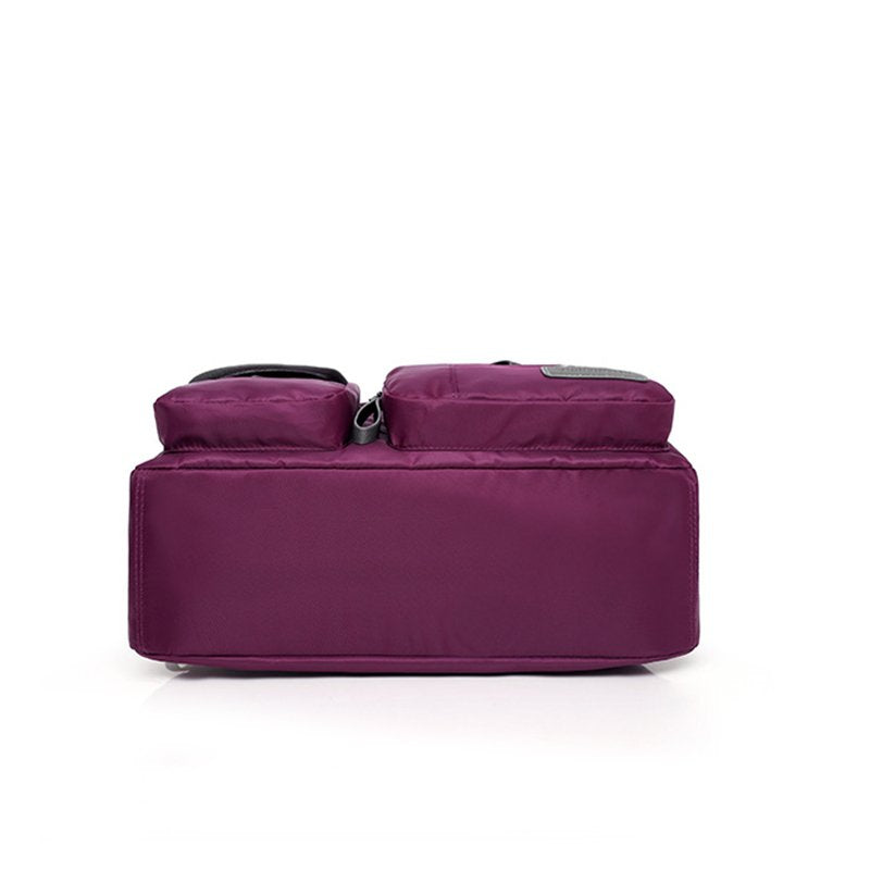 Sac à dos violet prune jolieandjuliette fonctionnel poches multiples base plate élégant