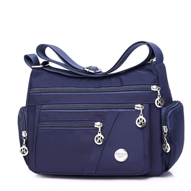 Sac bandoulière bleu marine jolieandjuliette multipoches fonctionnel élégant femme