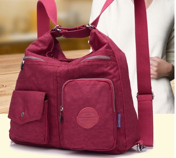 Sac bandoulière bordeaux jolieandjuliette multi-poches en nylon léger pour femme