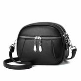 Sac bandoulière cuir noir jolieandjuliette compact double zip fermeture argent