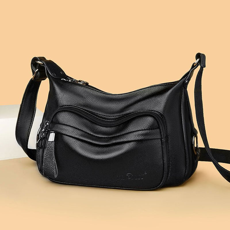 Sac bandoulière cuir noir jolieandjuliette multiples poches zippées femme élégant