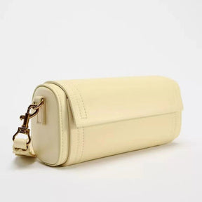 Sac bandoulière cylindrique en cuir crème jolieandjuliette élégant avec fermoir doré