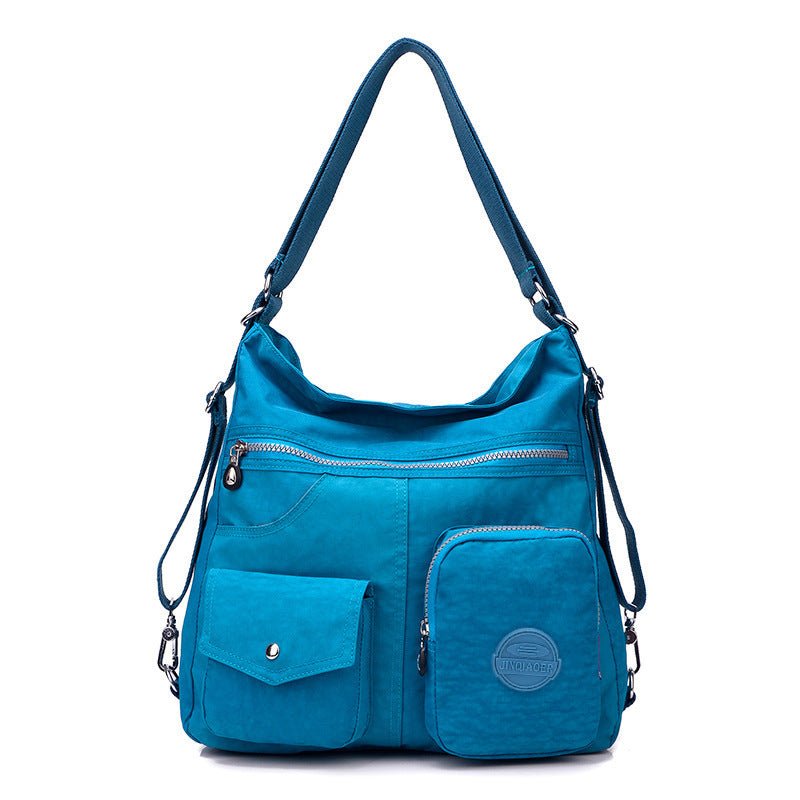 Sac à main bandoulière bleu azur jolieandjuliette multifonction poches multiples femme