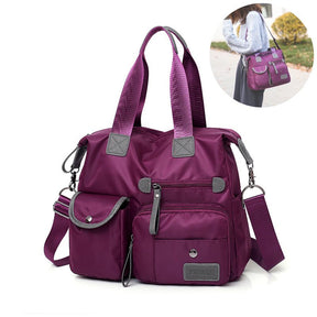 Sac à main violet multifonction jolieandjuliette avec bandoulière et poches multiples