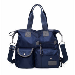 Sac bandoulière multipoches bleu marine en nylon jolieandjuliette fonctionnel et élégant