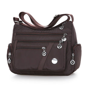 Sac bandoulière marron multipoches jolieandjuliette pratique et élégant pour femme