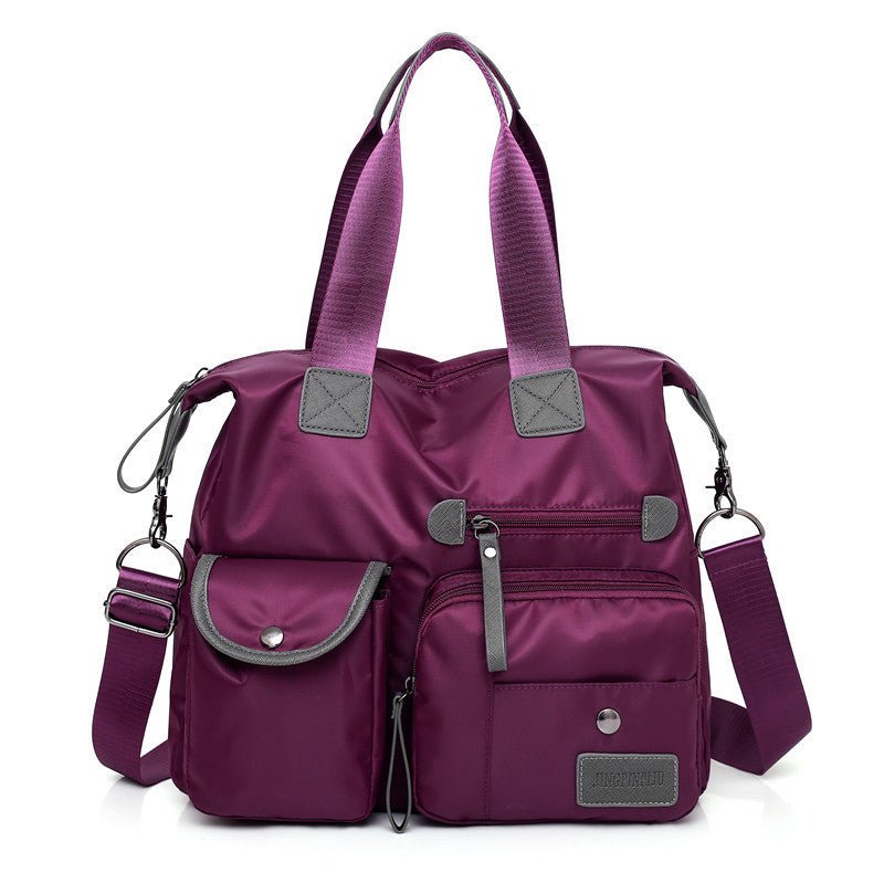 Sac bandoulière multipoches violet jolieandjuliette en nylon résistant pour femme active