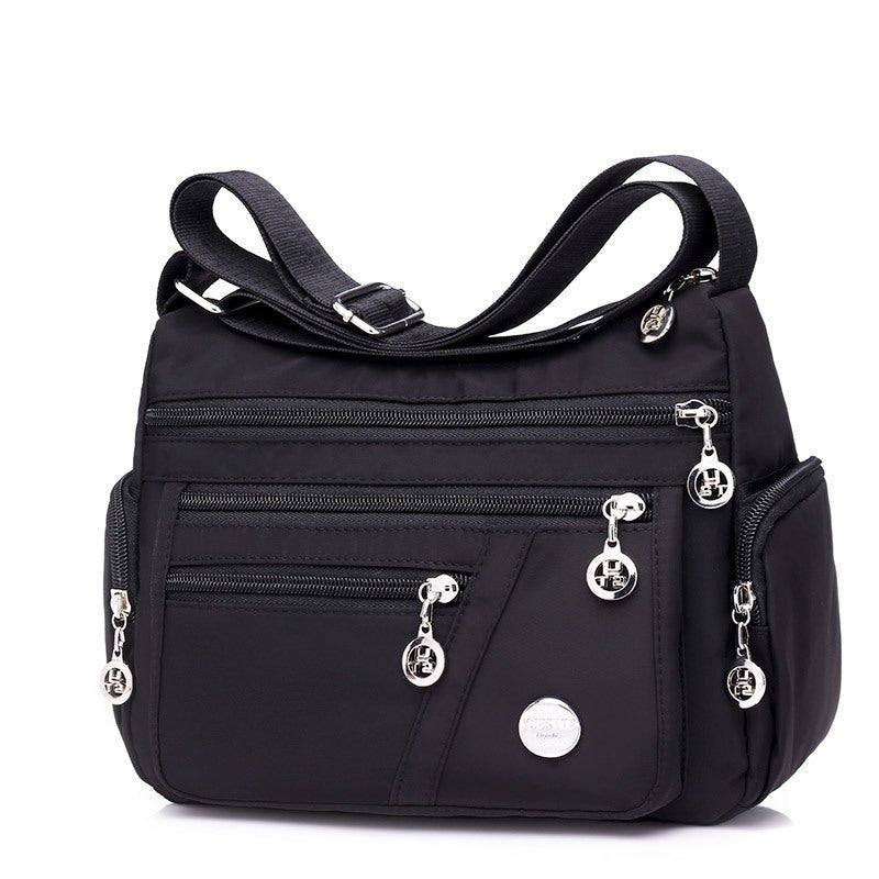 Sac bandoulière noir jolieandjuliette multipoches urbain femme pratique léger