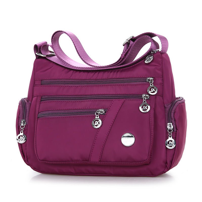 Sac bandoulière nylon prune jolieandjuliette multi-poches zippées femme pratique