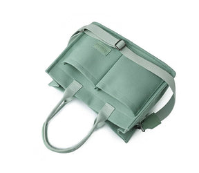 Sac bandoulière vert menthe jolieandjuliette élégant multipoches avec poignées