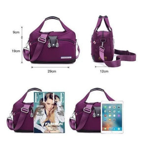 Sac bandoulière violet jolieandjuliette multi-poches compact comparé iPad magazine