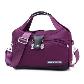 Sac bandoulière violet jolieandjuliette compact multifonction avec poches zippées