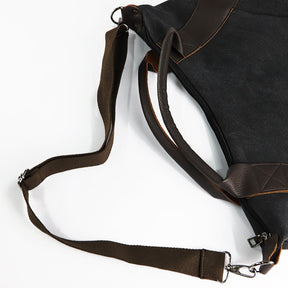 Sac besace noir jolieandjuliette avec bandoulière ajustable et anses en cuir