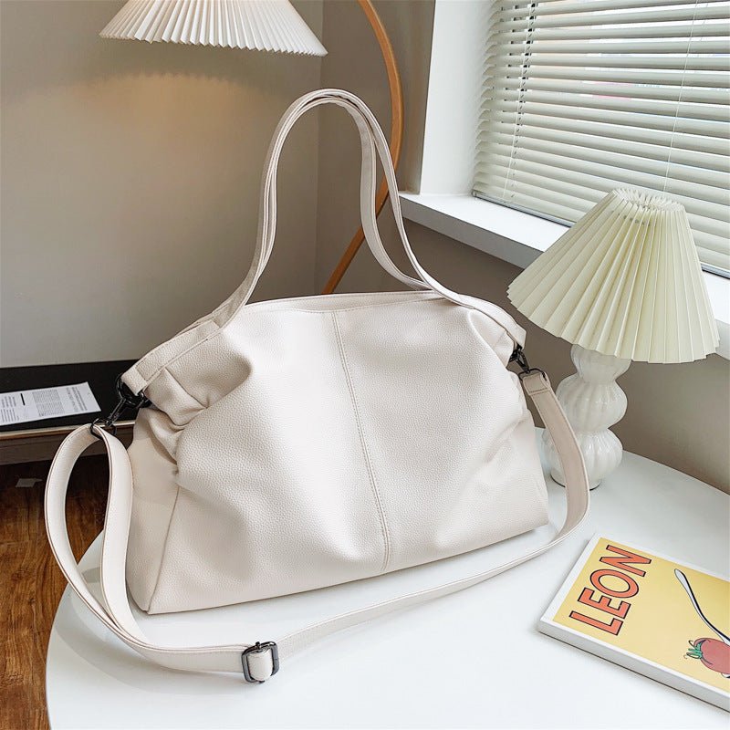 Sac à main blanc cassé spacieux jolieandjuliette avec bandoulière style minimaliste élégant