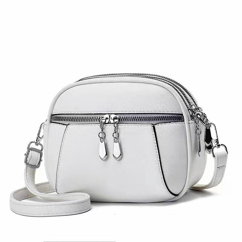 Sac à main blanc jolieandjuliette mini cuir bandoulière zips multiples élégant