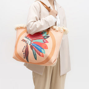 Sac cabas plage jolieandjuliette motif plumes indiennes colorées avec franges