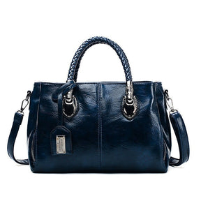 Sac à main cuir bleu marine jolieandjuliette bandoulière tressée élégant femme