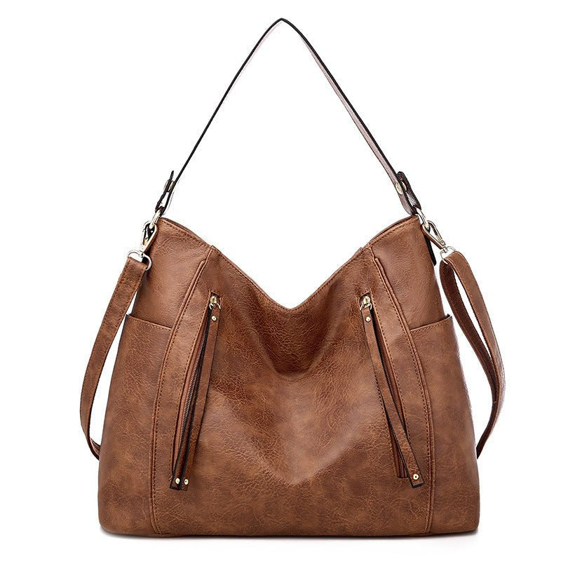 Sac hobo cuir camel jolieandjuliette avec bandoulière et zips décoratifs élégant