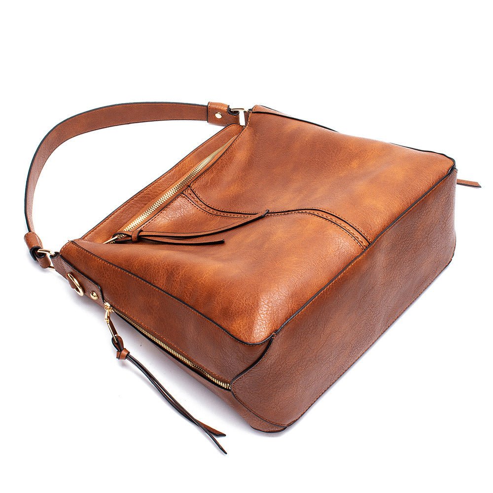 Sac bandoulière cuir cognac jolieandjuliette zippé élégant femme spacieux