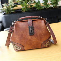 Sac à main cuir cognac jolieandjuliette vintage avec fermoir et détails hexagonaux