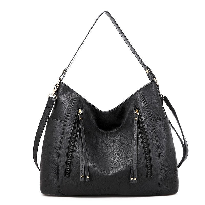 Sac hobo cuir noir jolieandjuliette bandoulière ajustable zips décoratifs élégant