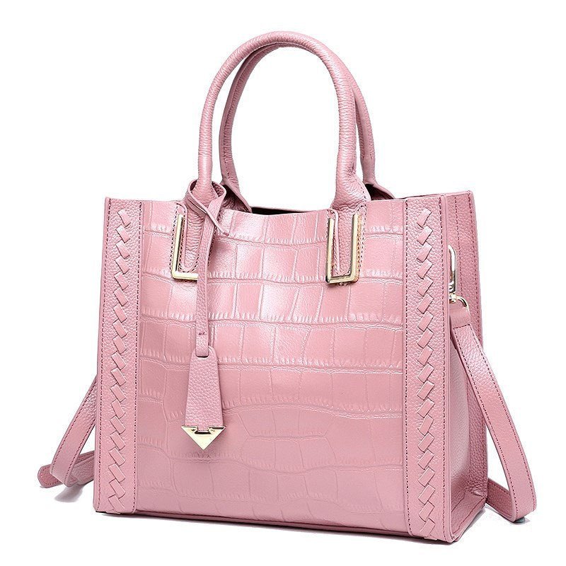 Sac à main rose cuir croco jolieandjuliette avec détails tressés et bandoulière amovible