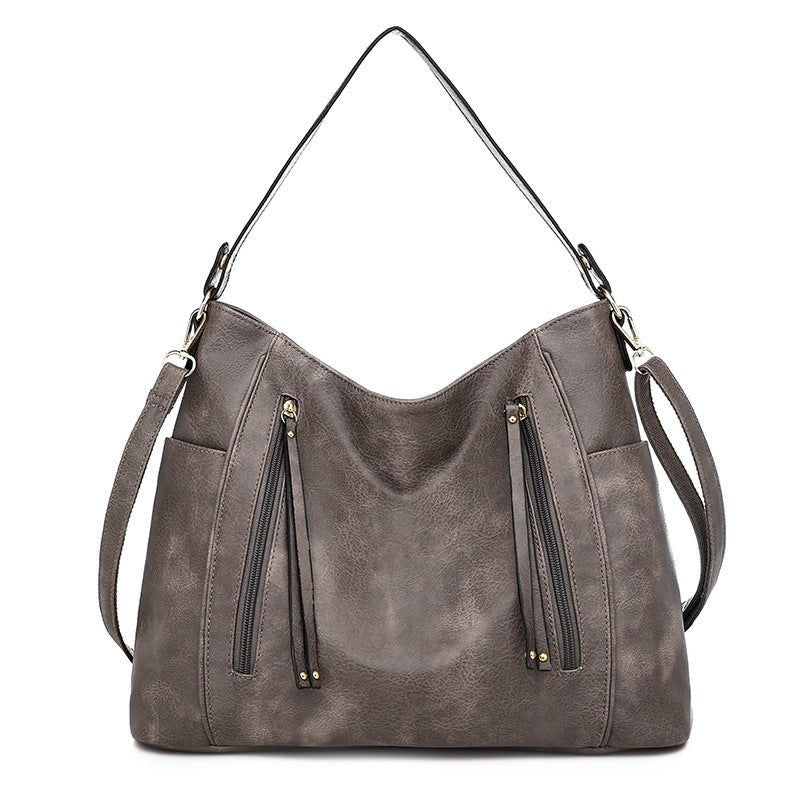 Sac à main gris jolieandjuliette en cuir synthétique avec double fermeture éclair et bandoulière ajustable