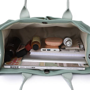 Intérieur organisé sac fourre-tout menthe jolieandjuliette avec ordinateur portable et accessoires