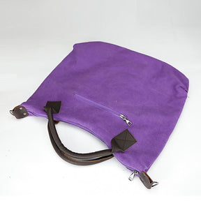 Sac fourre-tout violet en suède jolieandjuliette avec poignées en cuir marron