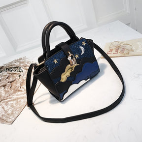 Sac à main cuir noir jolieandjuliette motif nuit étoilée bleu doré bandoulière