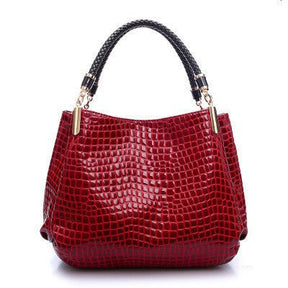 Sac à main cuir rouge motif croco jolieandjuliette anse tressée noire élégant