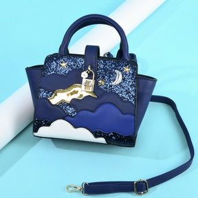 Sac à main Jolie and Juliette nuit étoilée bleu marine pailleté avec lune dorée