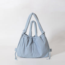 Sac matelassé bleu ciel jolieandjuliette double anses souple élégant femme