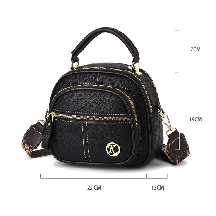 Sac à main noir compact jolieandjuliette multipoches avec bandoulière et dimensions détaillées