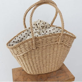 Sac en paille naturelle jolieandjuliette avec foulard à pois, parfait pour la plage