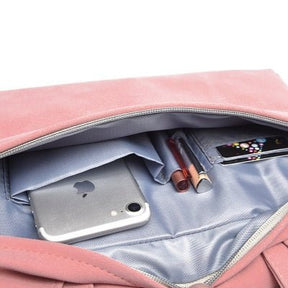 Intérieur organisé sac rose velours jolieandjuliette avec téléphone, crayons et compartiments