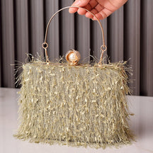 Sac de soirée doré à franges jolieandjuliette, pochette glamour pailletée avec anse métallique