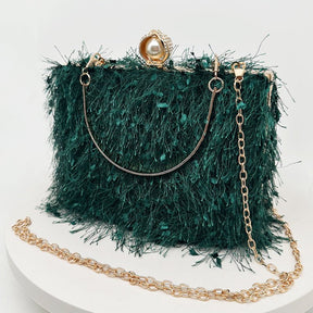 Sac de soirée vert émeraude texturé plumes jolieandjuliette avec fermoir perle élégant