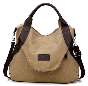 Sac fourre-tout hobo jolieandjuliette en toile beige et cuir marron avec bandoulière ajustable