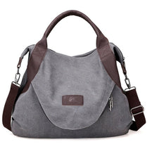 Sac hobo en toile grise et cuir marron jolieandjuliette avec bandoulière ajustable