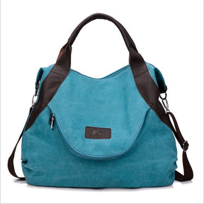 Sac en toile turquoise jolieandjuliette avec poignées et bandoulière en cuir marron
