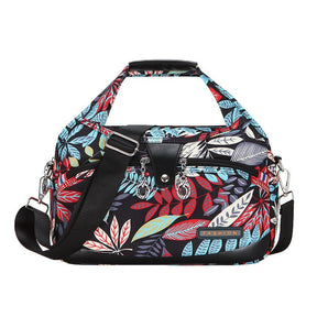 Sac de voyage jolieandjuliette motif floral multicolore avec bandoulière ajustable