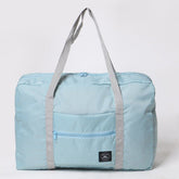 Sac de voyage pliable bleu clair jolieandjuliette léger et spacieux