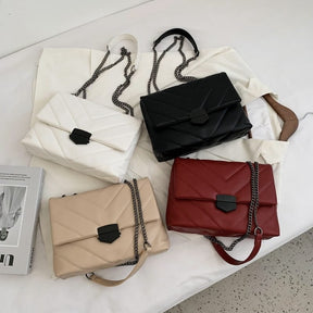 Sacs à main matelassés jolieandjuliette avec chaîne en blanc, noir, beige et rouge