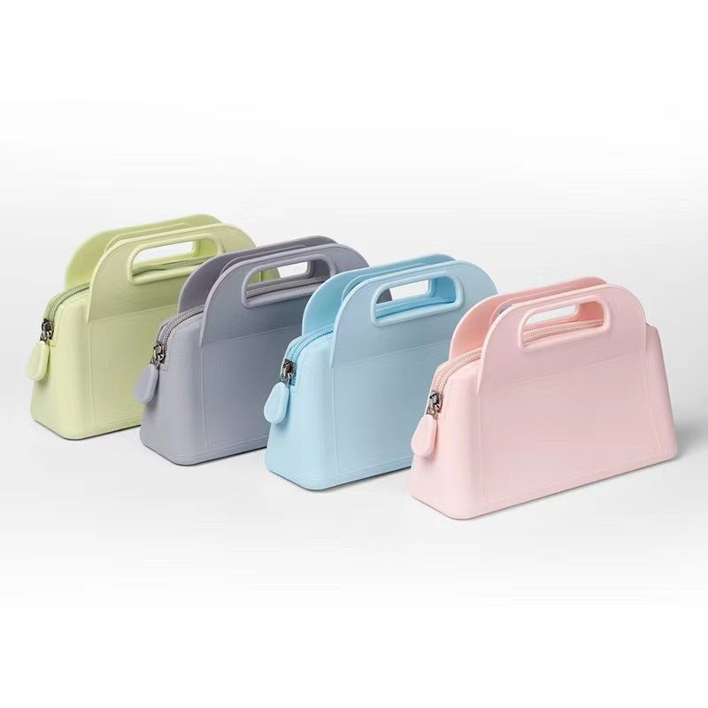 Collection de mini sacs pastel jolieandjuliette avec poignée en vert, gris, bleu et rose