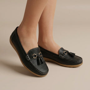 Penny loafers en cuir femme avec pompons décoratifs style intemporel