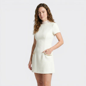Mini-robe de cocktail taillée ornée de perles avec poches femme
