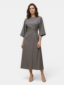 Robe midi portefeuille noire manches ballon ceinture auto-nouée soirée