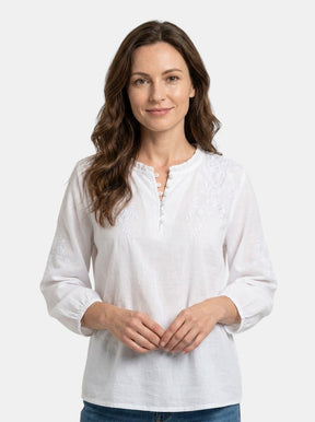 Blouse à broderies florales légère boutonnage classique élégante femme