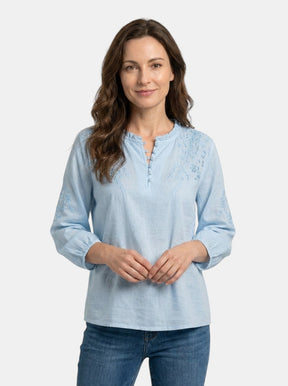 Blouse à broderies florales légère boutonnage classique élégante femme